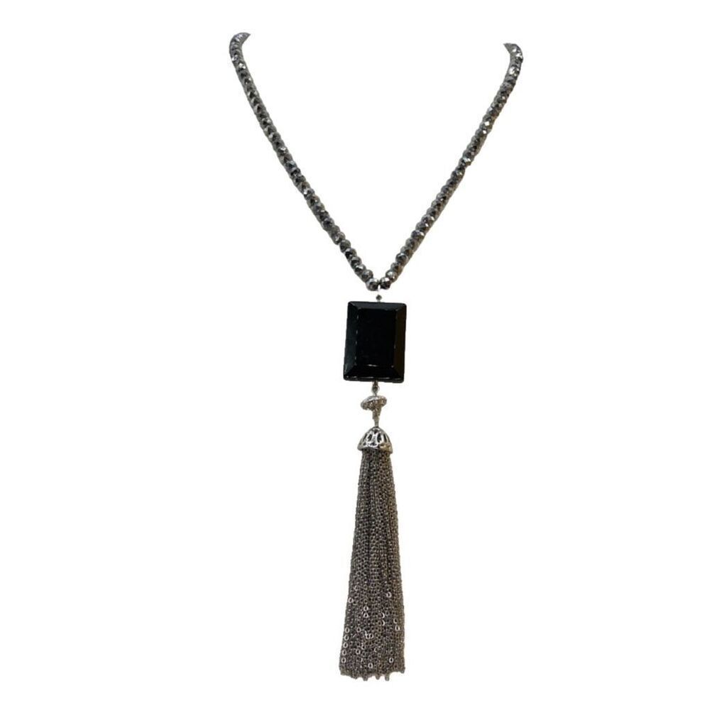 Long tassel boho 20” long necklace by The Limited